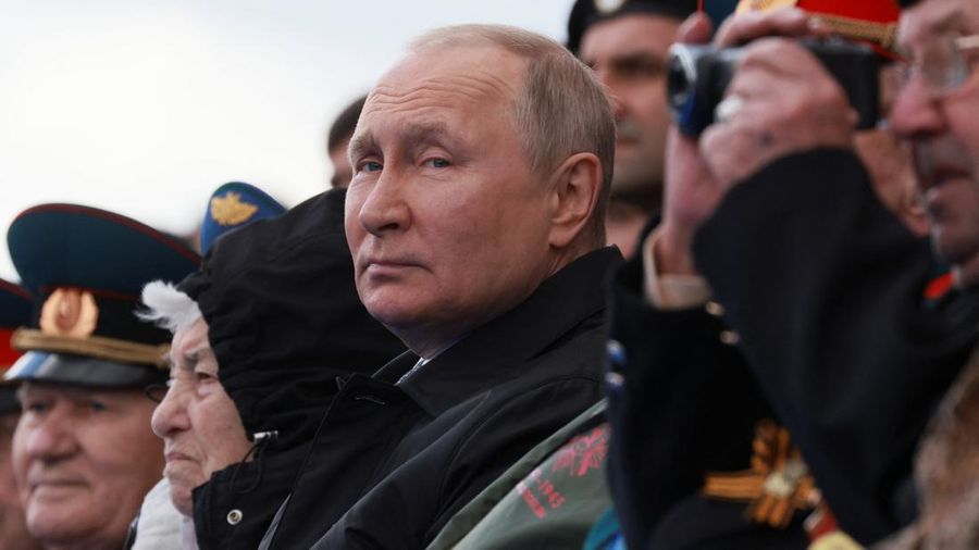 Russian President Vladimir Putin watches a military parade on Victory Day, which marks the 77th anniversary of the victory over Nazi Germany in World War Two, in Red Square in central Moscow, Russia May 9, 2022. Sputnik/Mikhail Metzel/Pool via REUTERS ATTENTION EDITORS - THIS IMAGE WAS PROVIDED BY A THIRD PARTY. THIS PICTURE WAS PROCESSED BY REUTERS TO ENHANCE QUALITY. AN UNPROCESSED VERSION HAS BEEN PROVIDED SEPARATELY.