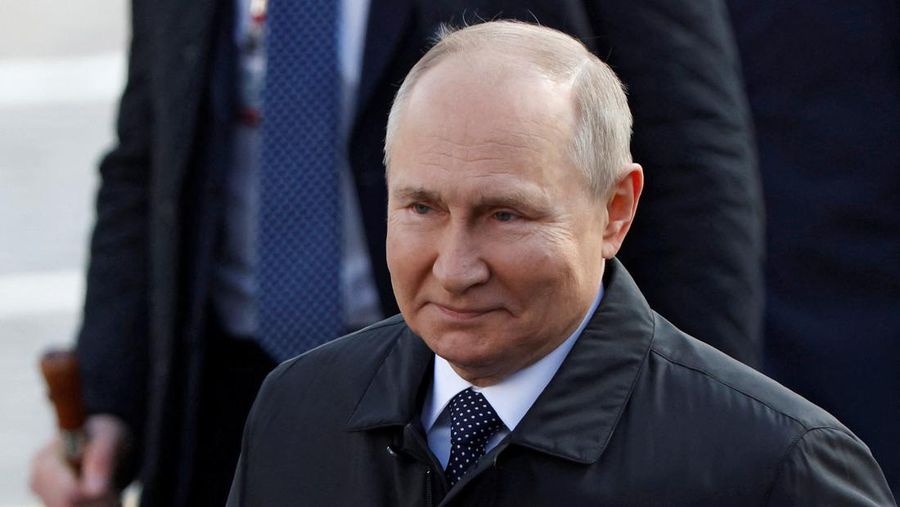 Russian President Vladimir Putin walks after a military parade on Victory Day, which marks the 77th anniversary of the victory over Nazi Germany in World War Two, in Red Square in central Moscow, Russia May 9, 2022. REUTERS/Maxim Shemetov