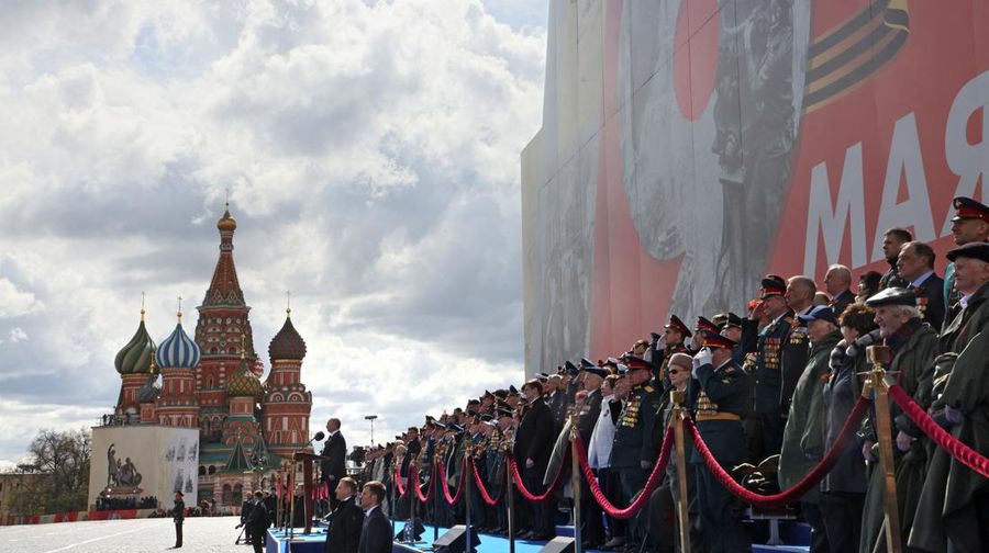 Russian President Vladimir Putin and spectators observe a moment of silence during a military parade on Victory Day, which marks the 77th anniversary of the victory over Nazi Germany in World War Two, in Red Square in central Moscow, Russia May 9, 2022. Sputnik/Mikhail Metzel/Pool via REUTERS ATTENTION EDITORS - THIS IMAGE WAS PROVIDED BY A THIRD PARTY.