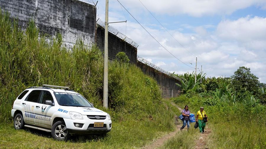 Soldiers patrol outside Bellavista prison where a deadly riot broke out overnight in Santo Domingo de los Tsachilas, Ecuador, Monday, May 9, 2022. (AP Photo/Dolores Ochoa)
