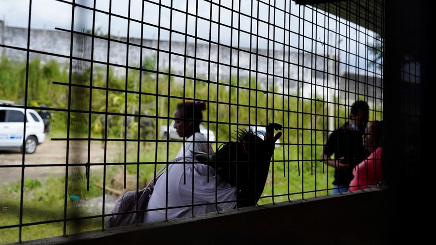 Soldiers patrol outside Bellavista prison where a deadly riot broke out overnight in Santo Domingo de los Tsachilas, Ecuador, Monday, May 9, 2022. (AP Photo/Dolores Ochoa)