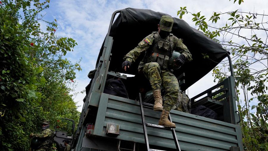 Soldiers patrol outside Bellavista prison where a deadly riot broke out overnight in Santo Domingo de los Tsachilas, Ecuador, Monday, May 9, 2022. (AP Photo/Dolores Ochoa)