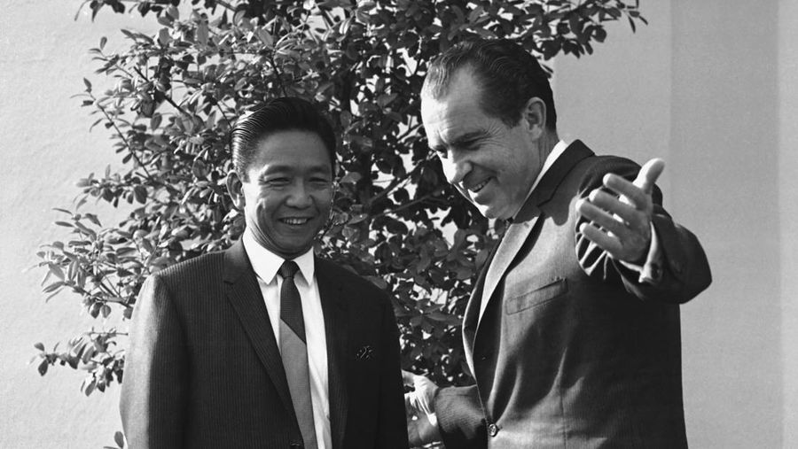 FILE- President Ferdinand Marcos of the Philippines, right, poses with his only son Ferdinand 'Bongbong