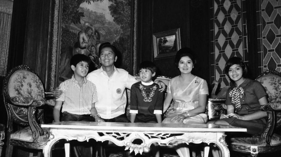 FILE- President Ferdinand Marcos of the Philippines, right, poses with his only son Ferdinand 'Bongbong