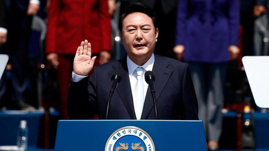 South Korean President Yoon Suk-yeol takes an oath during his inauguration in front of the National Assembly in Seoul, South Korea, May 10, 2022. Jeon Heon-Kyun /Pool via REUTERS       TPX IMAGES OF THE DAY