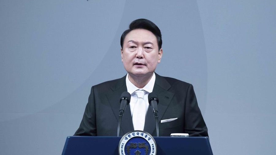 South Korean President Yoon Suk Yeol speaks during an inaugural dinner at a hotel in Seoul, South Korea, Tuesday, May 10, 2022. (Jeon Heon-Kyun/Pool Photo via AP)