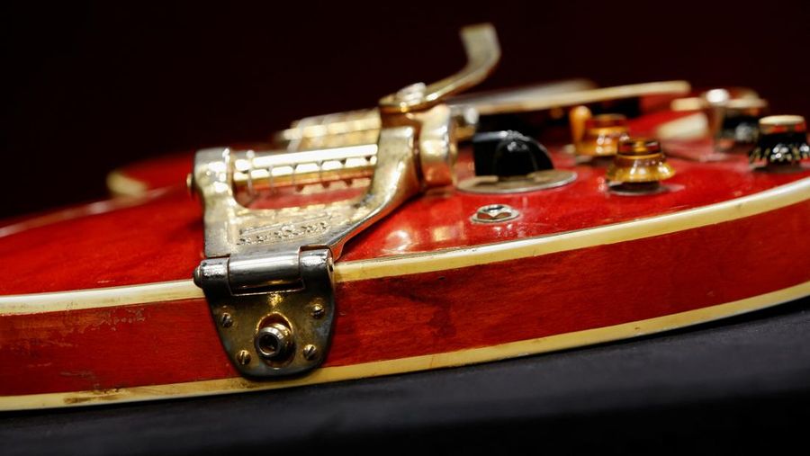 The Oasis band member Noel Gallagher's Gibson ES-355 guitar, destroyed during an argument with his brother at Paris' Rock en Seine festival in 2009, is displayed during a media preview at Hotel Drouot ahead of the auction in Paris, France, May 13, 2022. REUTERS/Benoit Tessier