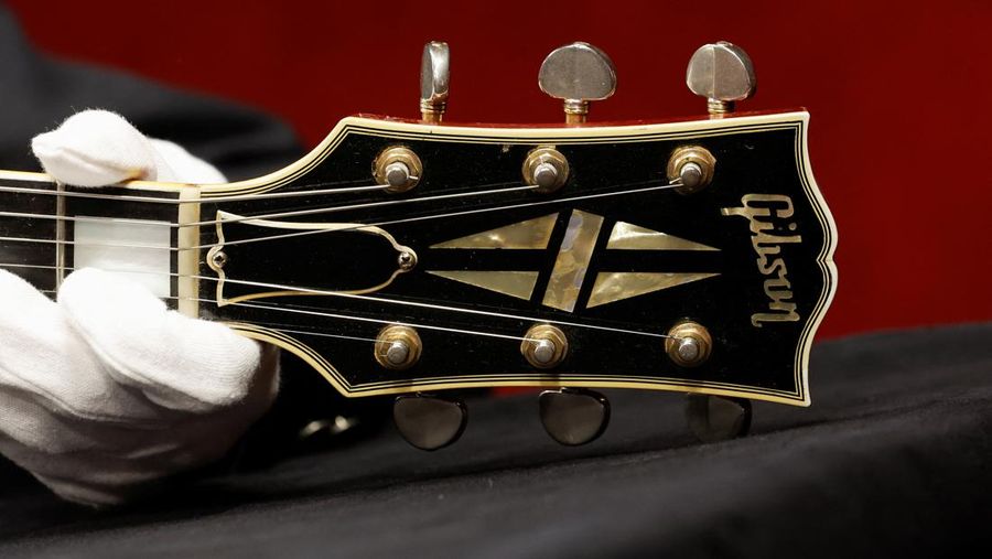 The Oasis band member Noel Gallagher's Gibson ES-355 guitar, destroyed during an argument with his brother at Paris' Rock en Seine festival in 2009, is displayed during a media preview at Hotel Drouot ahead of the auction in Paris, France, May 13, 2022. REUTERS/Benoit Tessier