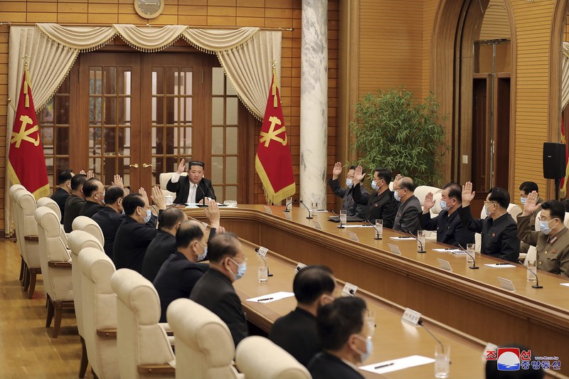 Virus Outbreak North Korea In this image made from video broadcasted by North Korea's KRT, North Korean leader Kim Jong Un wears a face mask on state television during a meeting acknowledging the country's first case of COVID-19 Thursday, May 12, 2022, in Pyongyang, North Korea. North Korea imposed a nationwide lockdown Thursday to control its first acknowledged COVID-19 outbreak after holding for more than two years to a widely doubted claim of a perfect record keeping out the virus that has spread to nearly every place in the world. (KRT via AP)