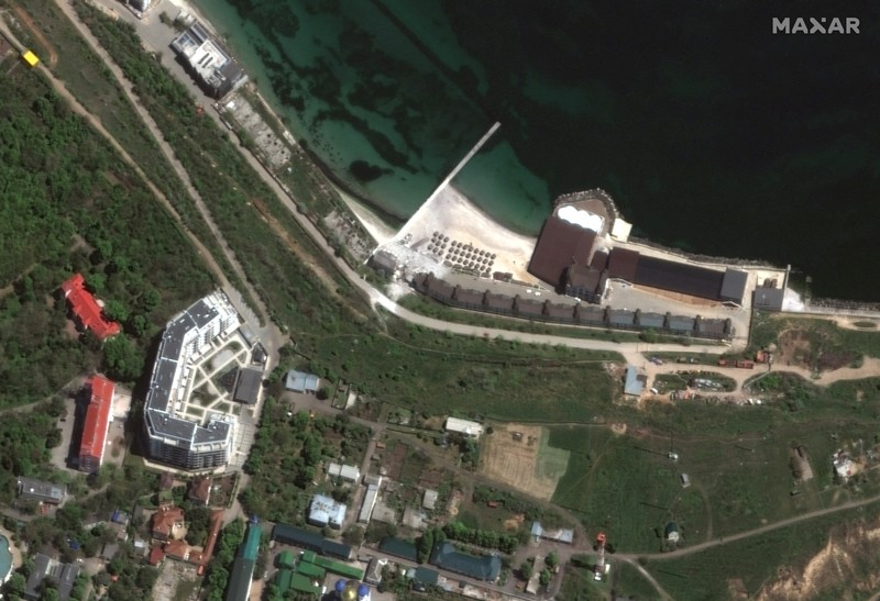 A satellite image shows an overview of Snake Island, Ukraine May 12, 2022. Picture taken May 12, 2022. Satellite image 2022 Maxar Technologies/Handout via REUTERS ATTENTION EDITORS - THIS IMAGE HAS BEEN SUPPLIED BY A THIRD PARTY. MANDATORY CREDIT. NO RESALES. NO ARCHIVES. DO NOT OBSCURE LOGO.