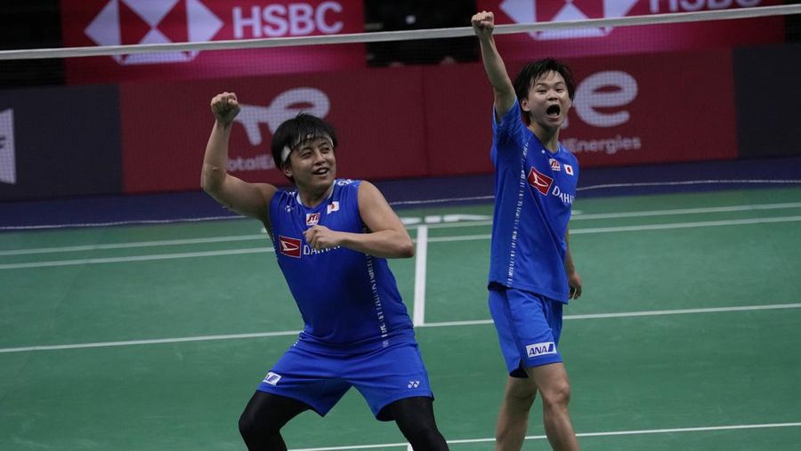Indonesia's Anthony Ginting returns a shot to Japan's Kento Momota during their men's single semi-final match at Thomas & Uber Cup in Bangkok, Thailand, Friday, May 13, 2022. (AP Photo/Sakchai Lalit)