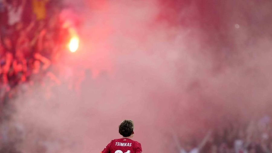 Liverpool's Kostas Tsimikas celebrates after scores the winning penalty in a penalty shootout at the end of the English FA Cup final soccer match between Chelsea and Liverpool, at Wembley stadium, in London, Saturday, May 14, 2022. (AP Photo/Kirsty Wigglesworth)