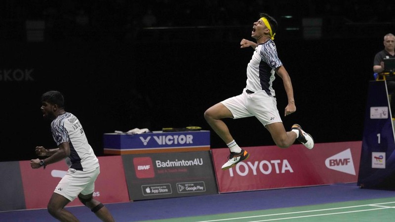 Indonesia's Anthony Ginting returns a shot to India's Lakshya Sen during their men's singles final badminton match at Thomas & Uber Cup in Bangkok, Thailand, Sunday, May 15, 2022. (AP Photo/Sakchai Lalit)