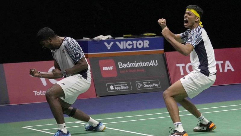 Indonesia's Anthony Ginting returns a shot to India's Lakshya Sen during their men's singles final badminton match at Thomas & Uber Cup in Bangkok, Thailand, Sunday, May 15, 2022. (AP Photo/Sakchai Lalit)