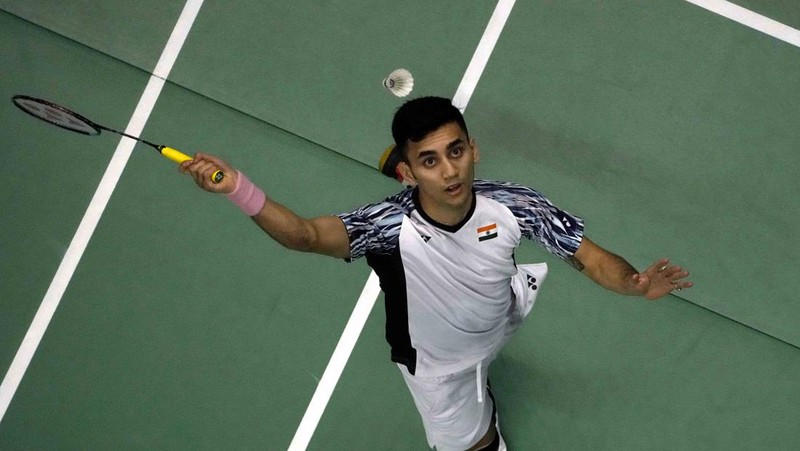 Indonesia's Anthony Ginting returns a shot to India's Lakshya Sen during their men's singles final badminton match at Thomas & Uber Cup in Bangkok, Thailand, Sunday, May 15, 2022. (AP Photo/Sakchai Lalit)
