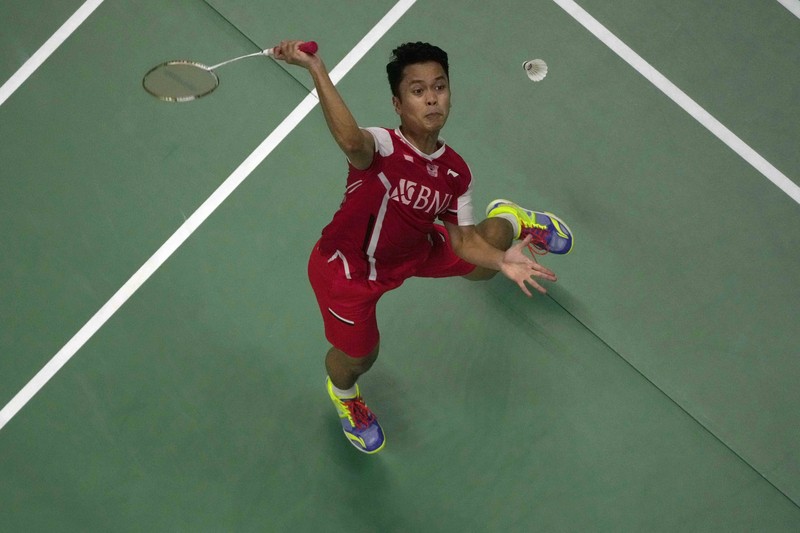 Indonesia's Anthony Ginting returns a shot to India's Lakshya Sen during their men's singles final badminton match at Thomas & Uber Cup in Bangkok, Thailand, Sunday, May 15, 2022. (AP Photo/Sakchai Lalit)