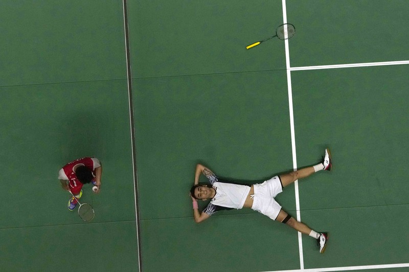 Thailand Badminton Thomas & Uber Cup Indonesia's Anthony Ginting returns a shot to India's Lakshya Sen during their men's singles final badminton match at Thomas & Uber Cup in Bangkok, Thailand, Sunday, May 15, 2022. (AP Photo/Sakchai Lalit)