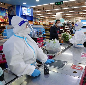 Potret Terbaru Covid-19 China, Pedagang Pasarpun Pakai APD