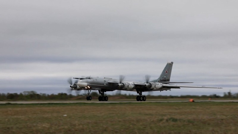 Russia Military In this photo released by Russian Defense Ministry Press Service on Tuesday, May 24, 2022, A Tu-95 strategic bomber of the Russian air force flies on a mission at an undisclosed location. (Russian Defense Ministry Press Service via AP)
