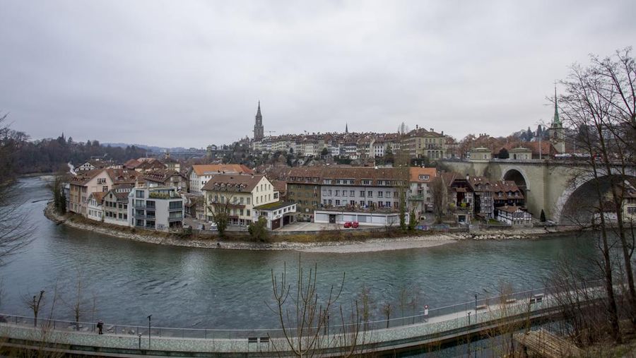 BERN, SWITZERLAND - JANUARY 01 : Panoramic view of The old town the medieval city center of Bern and the Aare River on January 01, 2019 in Bern, Switzerland. The old town is the medieval city center of Bern. Bern is the capital city of Switzerland, is built around the Aare River. Its origins back to the 12th century, with medieval architecture preserved in the Old Town. It is a UNESCO Cultural World Heritage Site since 1983 due to the compact and generally intact medieval core. (Photo by Athanasios Gioumpasis/Getty Images)