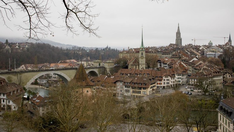 BERN, SWITZERLAND - JANUARY 01 : Panoramic view of  The old town the medieval city center of Bern and the Aare River on January 01, 2019 in Bern, Switzerland. The old town is the medieval city center of Bern. Bern is the capital city of Switzerland, is built around the Aare River.  Its origins back to the 12th century, with medieval architecture preserved in the Old Town. It is a UNESCO Cultural World Heritage Site since 1983 due to the compact and generally intact medieval core. (Photo by Athanasios Gioumpasis/Getty Images)