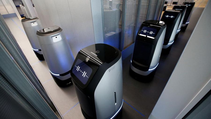 Robots using 5G networks charge at the Naver 1784 company office in Seongnam, South Korea, May 13, 2022. Picture taken May 13, 2022.  REUTERS/ Heo Ran