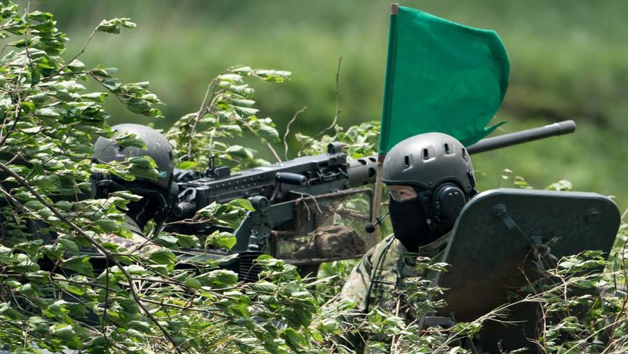 A Japan Ground Self-Defense Force (JGSDF) Type 10 battle tank fires ammunition during a live fire exercise at East Fuji Maneuver Area, in Gotemba, Shizuoka, Japan, May 28, 2022. Tomohiro Ohsumi/Pool via REUTERS