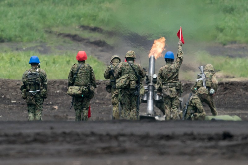 JAPAN-DEFENSE/ A Japan Ground Self-Defense Force (JGSDF) Type 10 battle tank fires ammunition during a live fire exercise at East Fuji Maneuver Area, in Gotemba, Shizuoka, Japan, May 28, 2022. Tomohiro Ohsumi/Pool via REUTERS