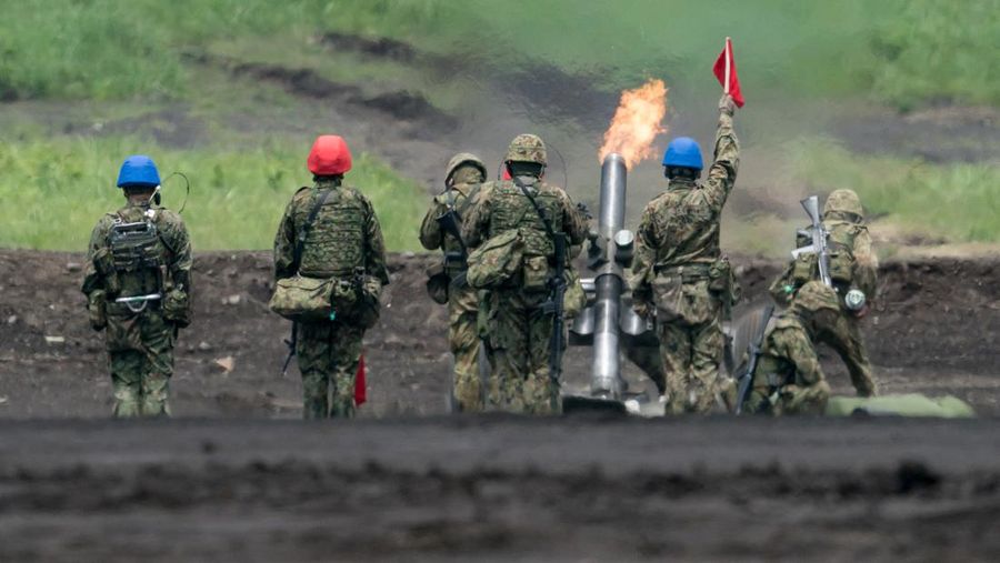 A Japan Ground Self-Defense Force (JGSDF) Type 10 battle tank fires ammunition during a live fire exercise at East Fuji Maneuver Area, in Gotemba, Shizuoka, Japan, May 28, 2022. Tomohiro Ohsumi/Pool via REUTERS