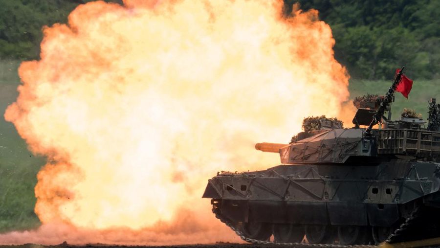 A Japan Ground Self-Defense Force (JGSDF) Type 10 battle tank fires ammunition during a live fire exercise at East Fuji Maneuver Area, in Gotemba, Shizuoka, Japan, May 28, 2022. Tomohiro Ohsumi/Pool via REUTERS
