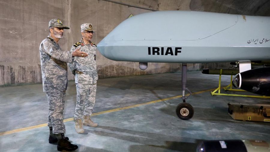 This handout picture provided by the Iranian Army on May 28, 2022, shows an underground drone base, in an unknown location in Iran. - Iranian state television on May 28 broadcast footage of an air force base for drones under the Zagros mountain range in the west of the country. The exact location of the base was not revealed, although the TV reporter said he travelled on a helicopter for nearly 40 minutes from the city of Kermanshah to reach it. (Photo by Iranian Army office / AFP) / RESTRICTED TO EDITORIAL USE - MANDATORY CREDIT 