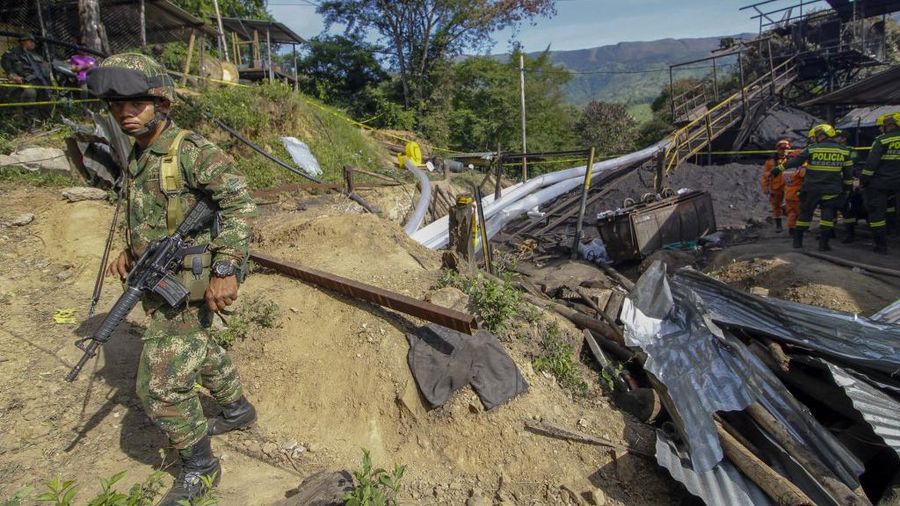 Aerial view showing the entrance to the coal mine in the Colombian municipality of Zulia, Norte de Santander Department, on the border with Venezuela, in which 14 miners are still trapped on June 1, 2022. - Rescuers were continuing on Wednesday to try to free 14 miners trapped for two days in a coal mine in Colombia following an explosion that killed one worker, official sources said. The miners are believed to be 200 meters underground with rescuers attempting to dig down 55 meters to access a ventilation circuit 