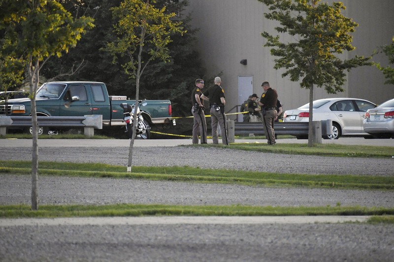 Church Shooting-Iowa Troopers from the Iowa State Patrol stand outside Cornerstone Church after a shooting on Thursday, June 2, 2022 in Ames, Iowa. Two people and a shooter died Thursday night in a shooting outside a church in Ames, authorities said. (Nirmalendu Majumdar/The Des Moines Register via AP)