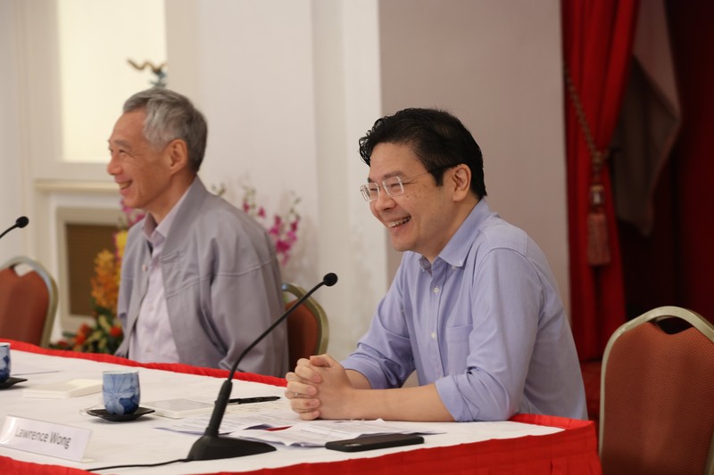 PM Singapura Lee Hsien Loong (kiri) dan Wakil PM Singapura Lawrence Wong (kanan)