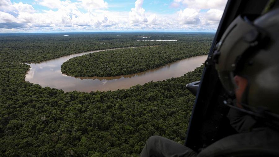 Police officers and rescue team conduct a search operation for British journalist Dom Phillips and indigenous expert Bruno Pereira, who went missing while reporting in a remote and lawless part of the Amazon rainforest near the border with Peru, in Atalaia do Norte, Amazonas state, Brazil, June 10, 2022.REUTERS/Bruno Kelly