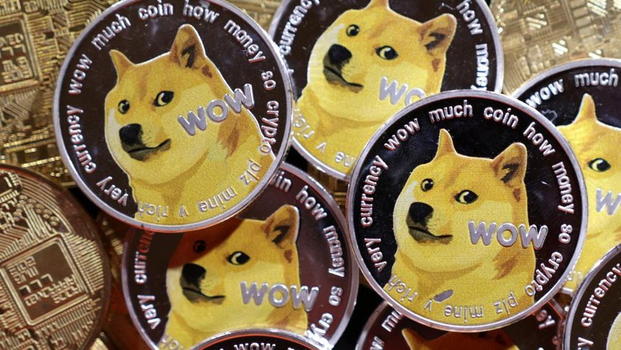 Representations of cryptocurrency Dogecoin are seen in this illustration taken June 16, 2022. REUTERS/Dado Ruvic/Illustration