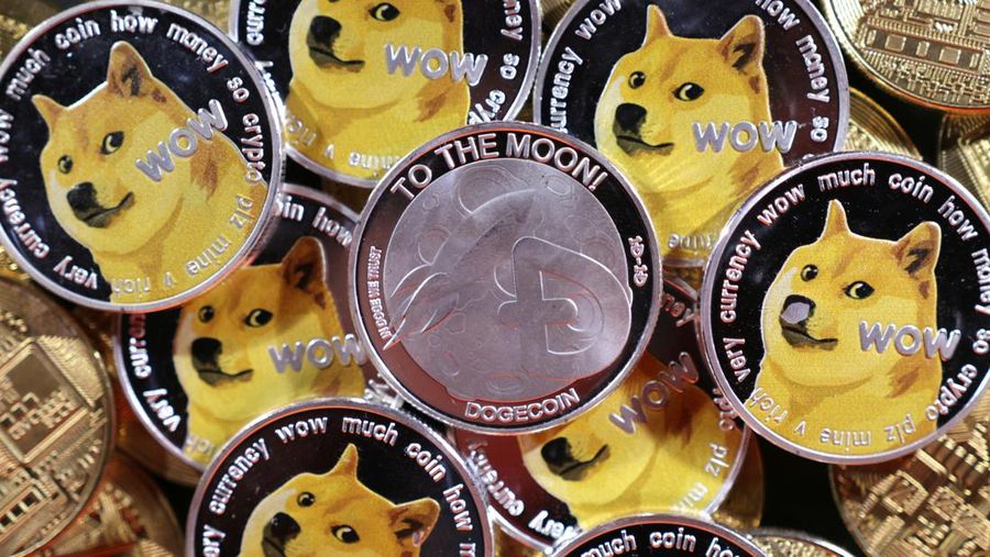 Representations of cryptocurrency Dogecoin are seen in this illustration taken June 16, 2022. REUTERS/Dado Ruvic/Illustration