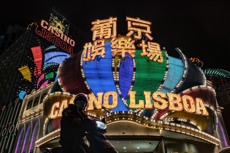 MACAO, CHINA - JUNE 19: People queue up for COVID-19 nucleic acid tests on June 19, 2022 in Macao, China. (Photo by VCG/VCG via Getty Images)