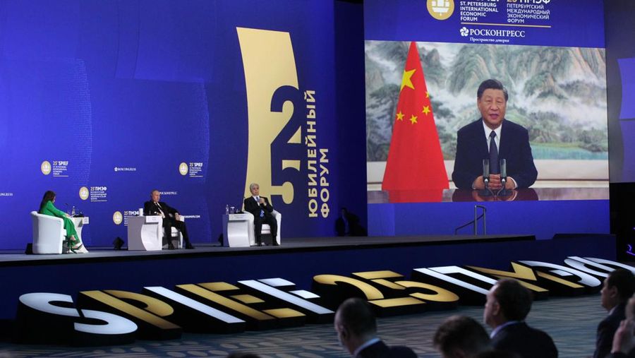 SAINT PETERSBURG, RUSSIA - JUNE 17: (RUSSIA OUT) Russian President Vladimir Putin looks at the screen with Chinese President Xi Jinping session during the Saint Petersburg Economic Forum SPIEF 2022, on June 17, 2022, in Saint Petersburg, Russia. Most Western business executives and leaders will be missing from the Russia's annual economic forum amid harsh sanctions against Russian after the country's military invasion of Ukraine. (Photo by Contributor/Getty Images)