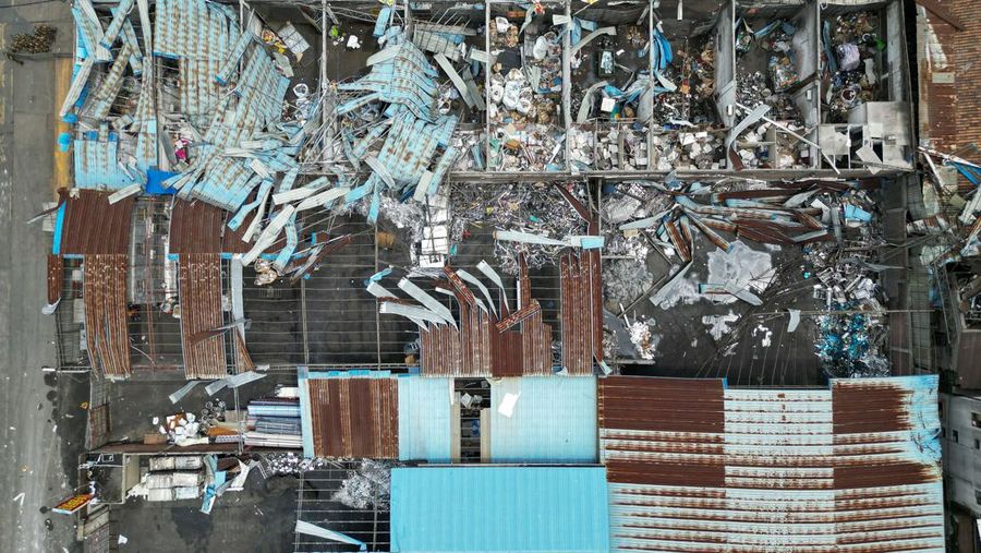 FOSHAN, CHINA - JUNE 19: An aerial view of factories roof blown down by strong winds in Foshan, Guangdong Province of China on June 19, 2022. At about 7:00 on the same day, a tornado occurred in Nanhai District, Foshan. Houses and trees were damaged on the site. (Photo by Stringer/Anadolu Agency via Getty Images)