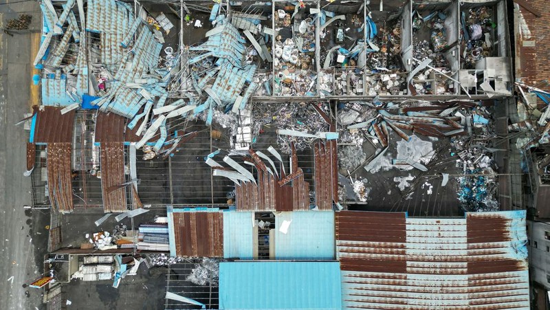 FOSHAN, CHINA - JUNE 19: An aerial view of factories roof blown down by strong winds in Foshan, Guangdong Province of China on June 19, 2022. At about 7:00 on the same day, a tornado occurred in Nanhai District, Foshan. Houses and trees were damaged on the site. (Photo by Stringer/Anadolu Agency via Getty Images)