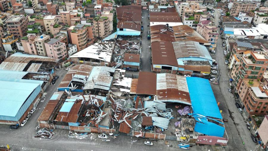 FOSHAN, CHINA - JUNE 19: An aerial view of factories roof blown down by strong winds in Foshan, Guangdong Province of China on June 19, 2022. At about 7:00 on the same day, a tornado occurred in Nanhai District, Foshan. Houses and trees were damaged on the site. (Photo by Stringer/Anadolu Agency via Getty Images)