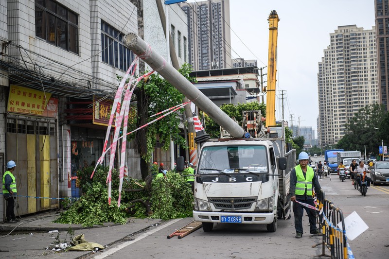 1241404449 FOSHAN, CHINA - JUNE 19: An aerial view of factories roof blown down by strong winds in Foshan, Guangdong Province of China on June 19, 2022. At about 7:00 on the same day, a tornado occurred in Nanhai District, Foshan. Houses and trees were damaged on the site. (Photo by Stringer/Anadolu Agency via Getty Images)