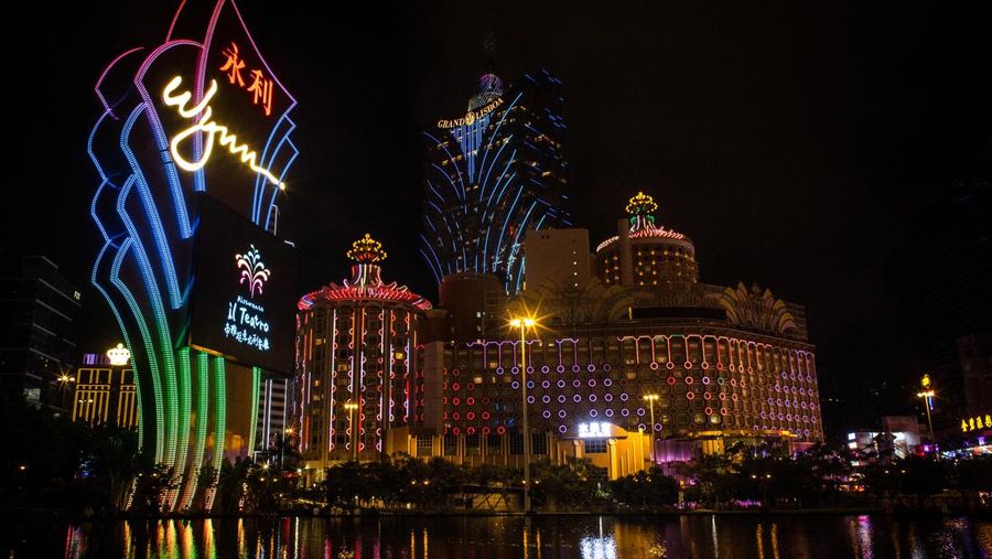 MACAO, CHINA - JUNE 19: People queue up for COVID-19 nucleic acid tests on June 19, 2022 in Macao, China. (Photo by VCG/VCG via Getty Images)