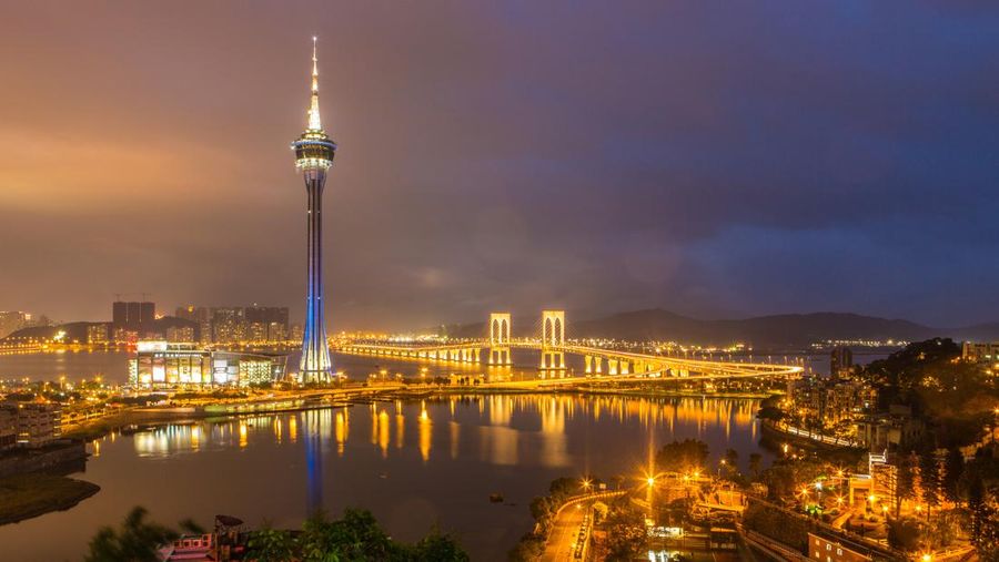 MACAU - APRIL 02: The Macau Tower seen from a vantage point at Penha Chapel is lit up blue for Autism Awareness and Autism Speaks on April 2, 2014 in Macau, Macau. (Photo by Callaghan Walsh/Getty Images)