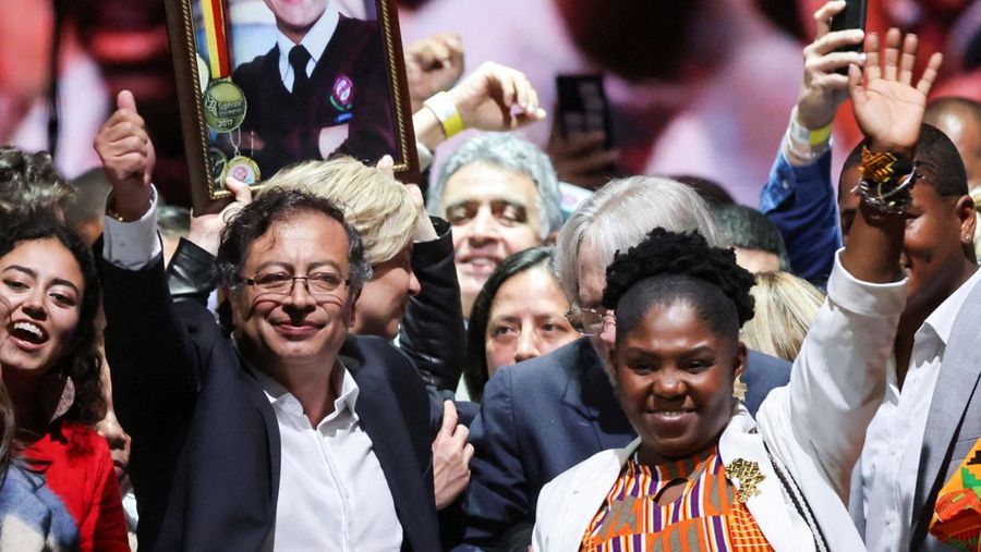 Colombian left-wing presidential candidate Gustavo Petro and his candidate for Vice-President Francia Marquez of the Historic Pact coalition celebrate after Petro's victory in the second round of the presidential election, at the Movistar Arena, in Bogota, Colombia June 19, 2022. REUTERS/Luisa Gonzalez     TPX IMAGES OF THE DAY