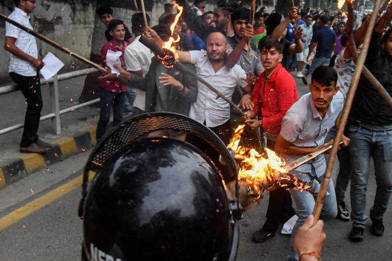 Student activists clash with police during a protest over hike in fuel prices in Kathmandu on June 20, 2022. (Photo by PRAKASH MATHEMA / AFP) (Photo by PRAKASH MATHEMA/AFP via Getty Images)