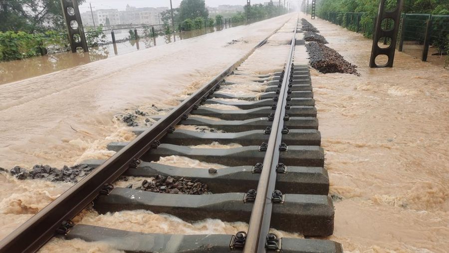 SHANGRAO, CHINA - JUNE 21: Aerial view of vehicles submerged in flood water on June 21, 2022 in Shangrao, Jiangxi Province of China. China's Jiangxi Province on Monday issued a red alert for floods. (Photo by Ai Shimin/VCG via Getty Images)