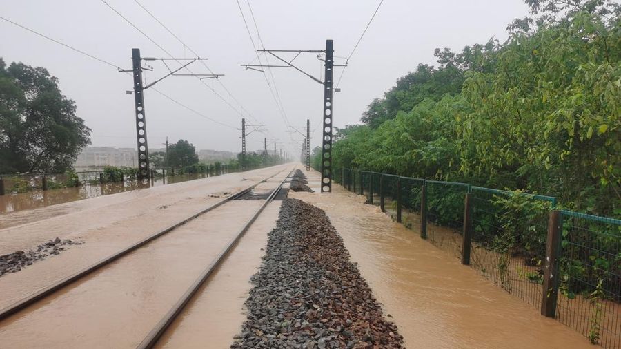 SHANGRAO, CHINA - JUNE 21: Aerial view of vehicles submerged in flood water on June 21, 2022 in Shangrao, Jiangxi Province of China. China's Jiangxi Province on Monday issued a red alert for floods. (Photo by Ai Shimin/VCG via Getty Images)