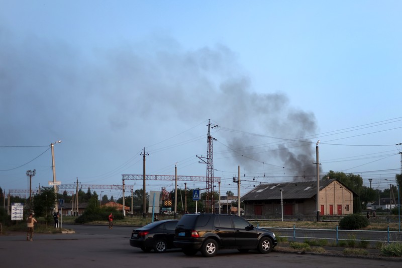 DRUZHKIVKA, UKRAINE - JUNE 20: Flames rise from a structure after it was hit by a projectile on June 20, 2022 in Druzhkivka, Ukraine. In recent weeks, Russia has concentrated its firepower on Ukraine's Donbas region, where it has long backed two separatist regions at war with the Ukrainian government since 2014. (Photo by Scott Olson/Getty Images)(Photo by Scott Olson/Getty Images)